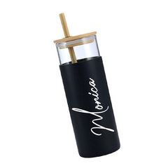 Black tumbler with wooden straw lid on a white background