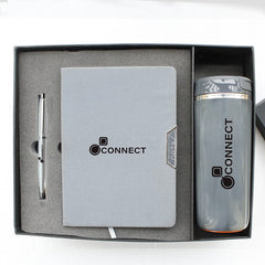 A corporate gift set containing a gray diary, a silver pen, and a stainless steel flask, all branded with the logo 'CONNECT'.