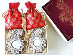 Set of handmade / hand-carved wood tea light holders and set of 2 pouches of mixed nuts and gourmet chocolates